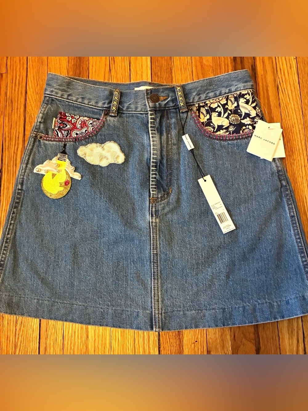 Marc Jacobs Denim Mini Skirt with Embroidered Cloud & Sun Accents